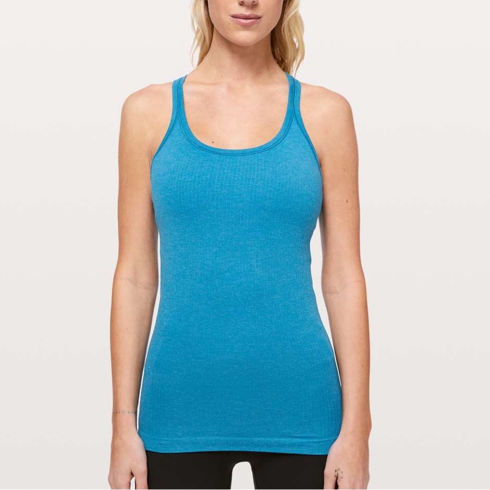 - Lululemon Ebb to street tank top. Like new, teal, size 4 built in bra